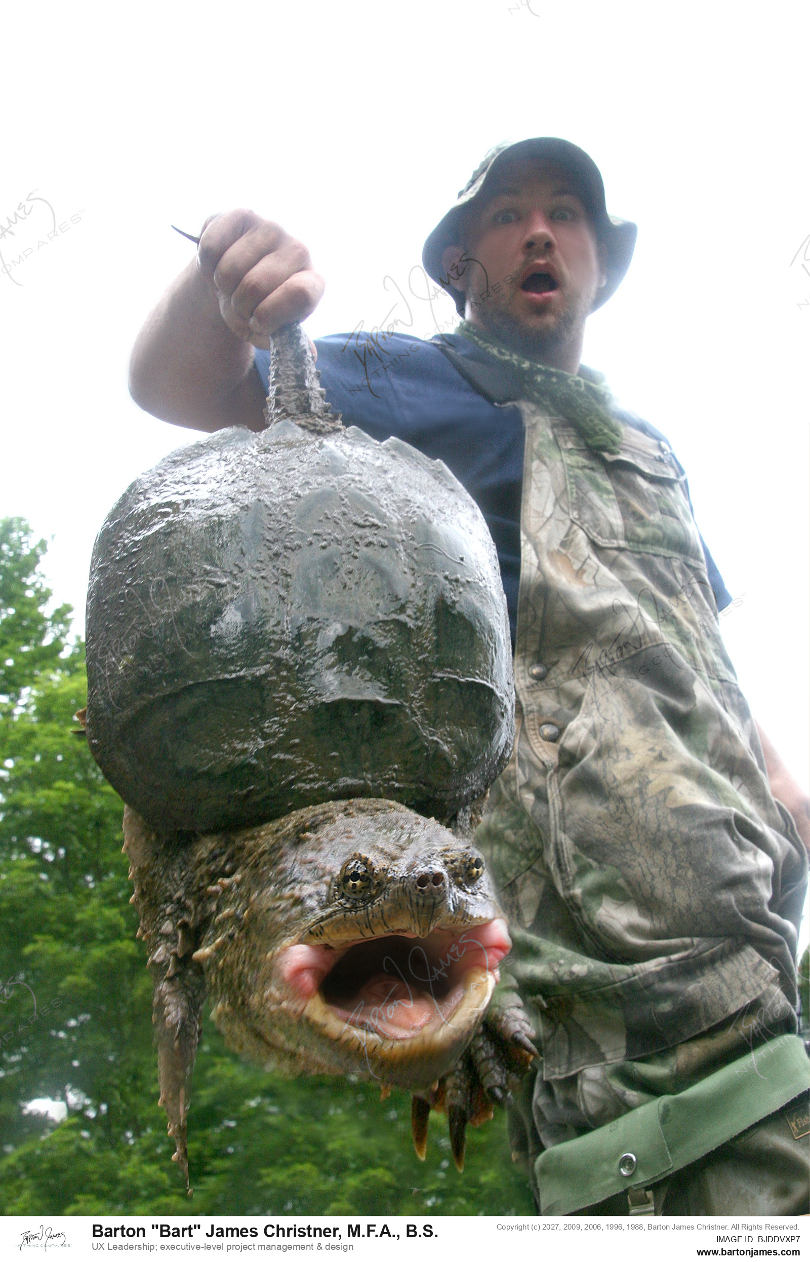 20130727 WILDLIFE CDAGiant Snapping Turtle Held By Competition PHOTO